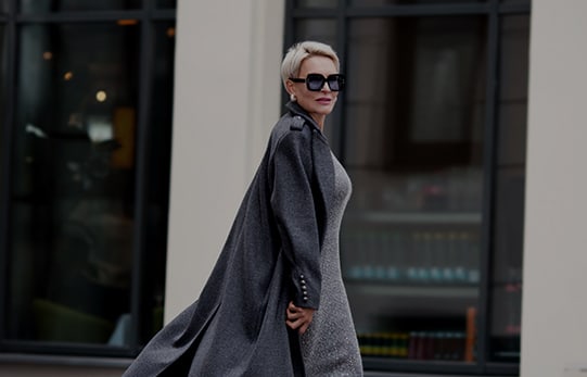 woman strutting with sunglasses